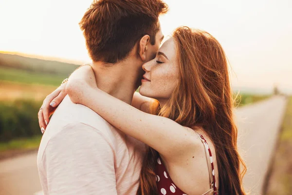white couple hug